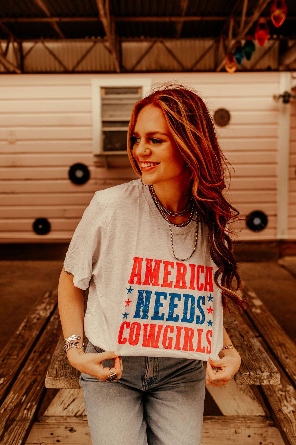 America Needs Cowgirls Graphic Tee