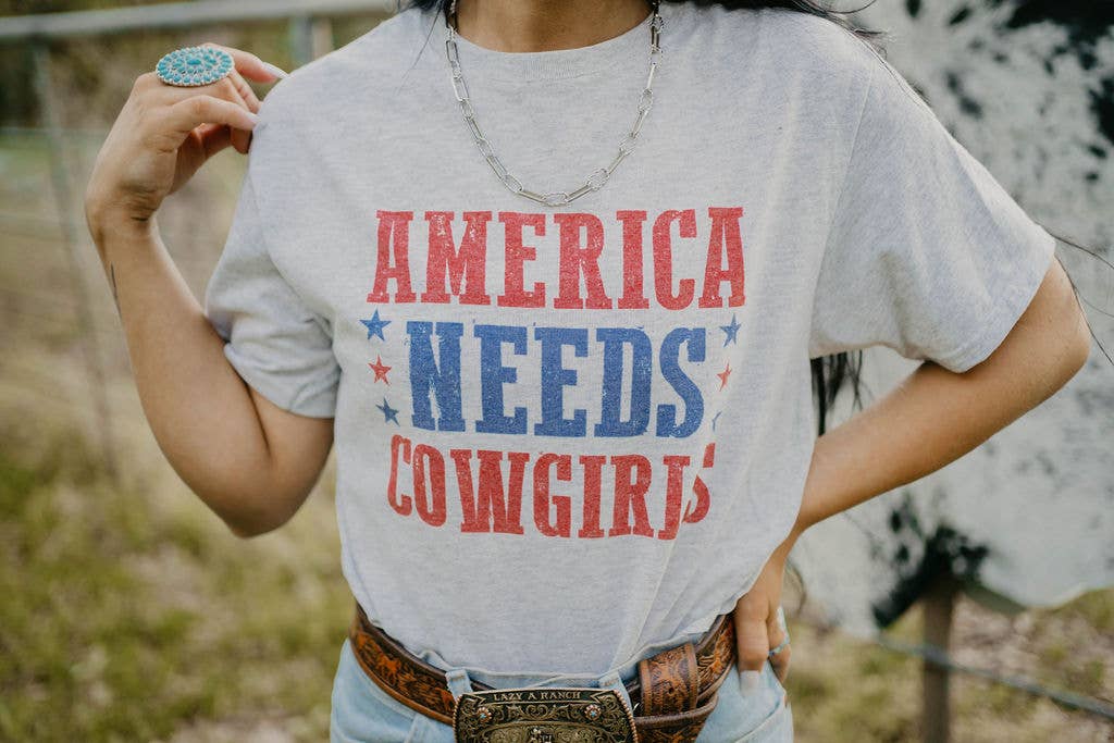 America Needs Cowgirls Graphic Tee