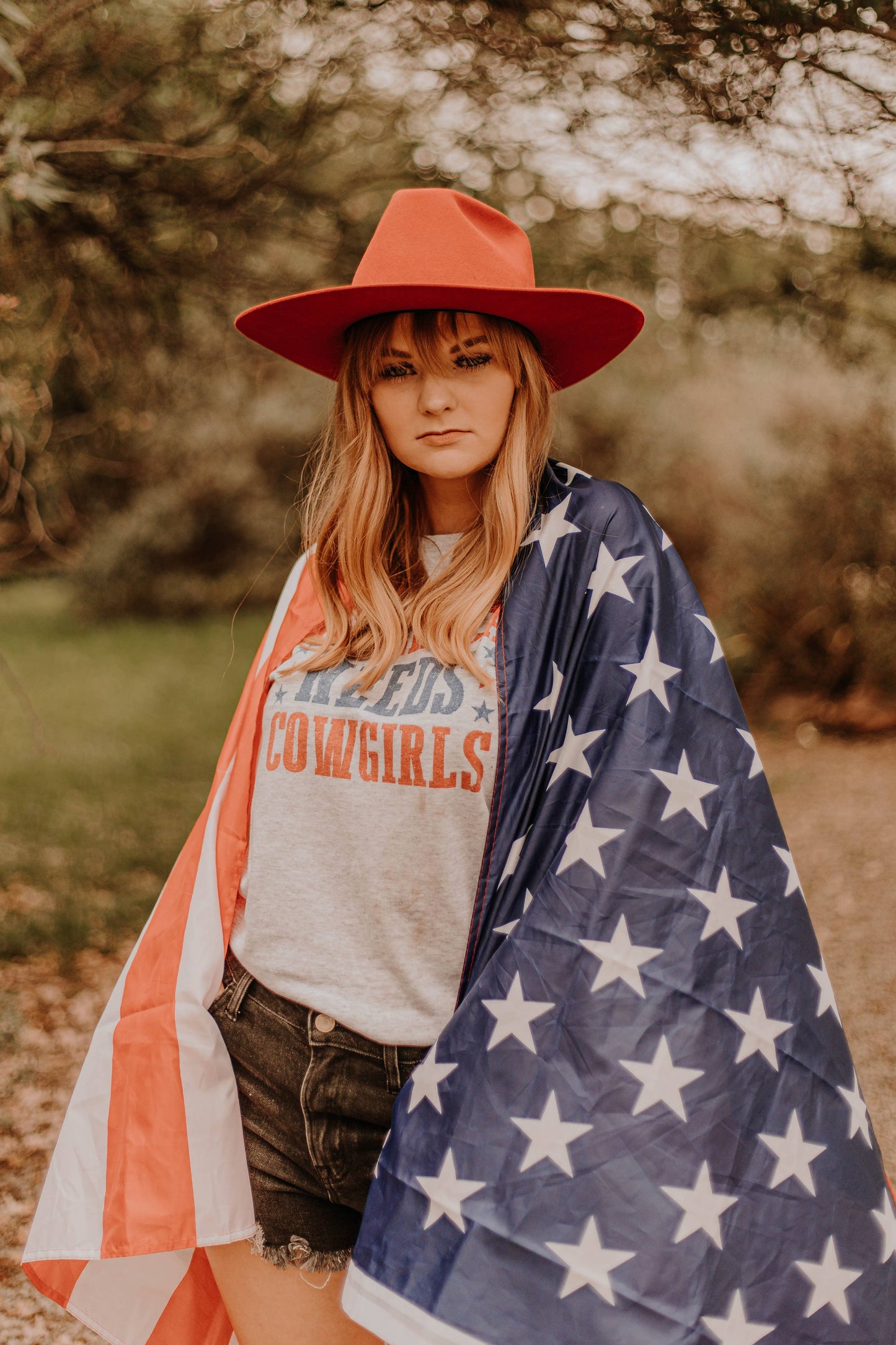 America Needs Cowgirls Graphic Tee