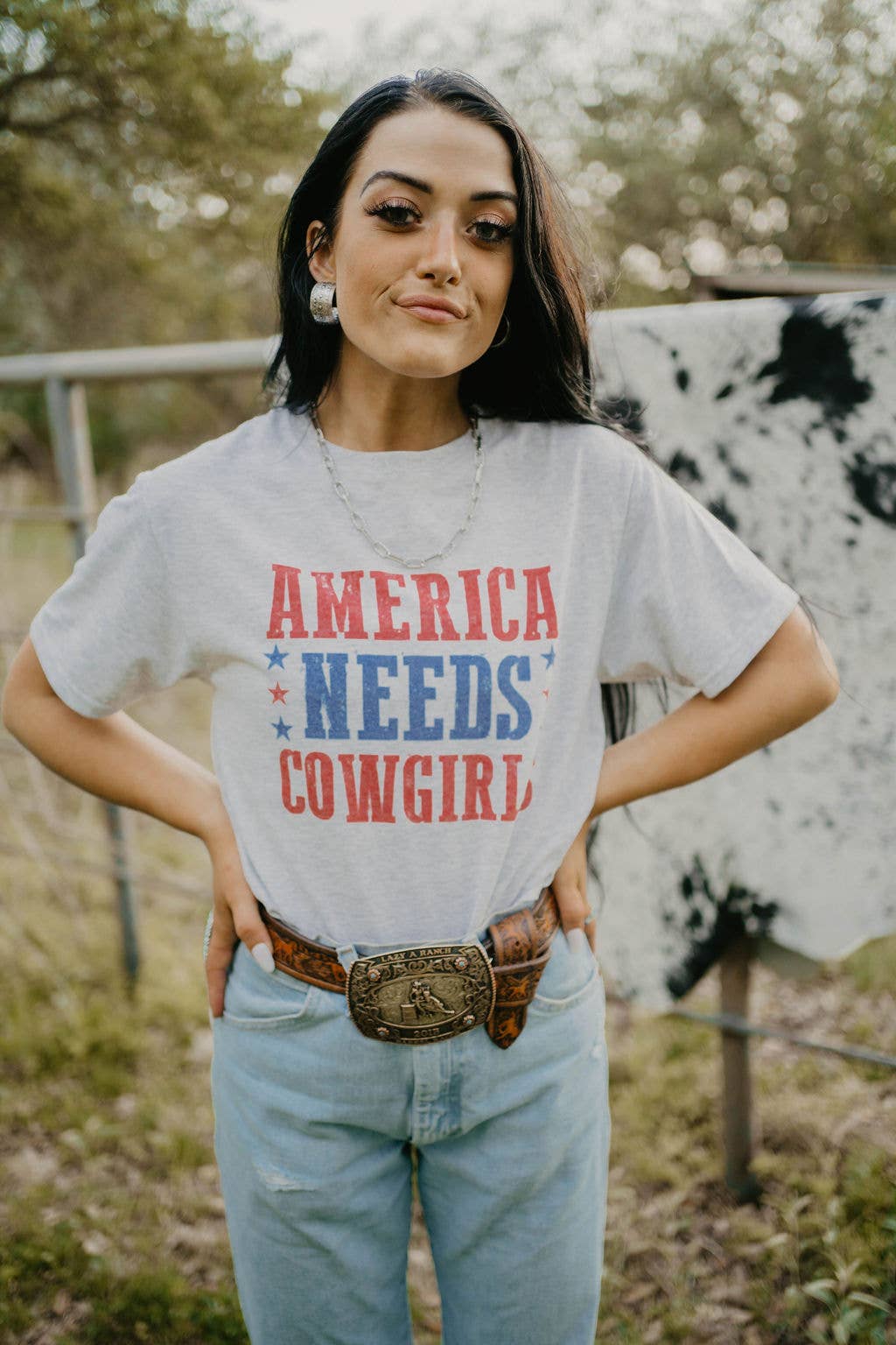 America Needs Cowgirls Graphic Tee